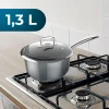 Imagen 3 Cazo Polka Classy de 16 cm y 1,3 L en acero inoxidable 18/10. Cuenta con revestimiento antiadherente, tapa de cristal y es apto para inducción y todo tipo de fuegos.