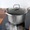 Imagen 6 Cazo Polka Classy de 16 cm y 1,3 L en acero inoxidable 18/10. Cuenta con revestimiento antiadherente, tapa de cristal y es apto para inducción y todo tipo de fuegos.