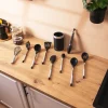 Imagen 3 Set de 9 utensilios de cocina Polka Exclusive Wood&Rock. Fabricados en silicona y nailon con mango de acero y acabado Soft Touch. Incluye bote soporte organizador.