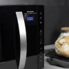 Imagen 4 Microondas sin plato de 23L con 800W y tecnología Flatbed. Dispone de 8 funciones preconfiguradas, panel táctil y temporizador de 95 min en elegante color negro.