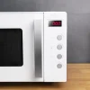 Imagen 6 Microondas sin plato GrandHeat 2000 Flatbed White de Cecotec. 20 litros de capacidad, 700W de potencia y base plana con interior cerámico fácil de limpiar.