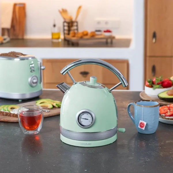 Imagen 3 Hervidor eléctrico de estilo vintage en acero inoxidable verde. 1,8L de capacidad, 2200W, medidor de temperatura y base 360º. Libre de BPA y apagado automático.