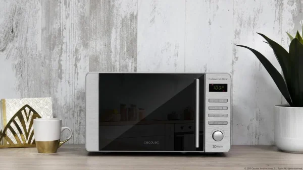 Imagen 3 Microondas Cecotec ProClean 5120 Inox de 20 L con 700 W y grill de 800 W. Incorpora revestimiento Ready2Clean, tecnología 3DWave y puerta de espejo.