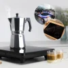 Imagen 4 Cafetera italiana Mokclassic 900 Shiny de Cecotec fabricada en aluminio fundido para 9 tazas. Diseño elegante con mango ergonómico y acabados de alta calidad.