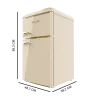 Imagen 3 Mini frigorífico retro beige de dos puertas con 86 litros de capacidad y eficiencia energética clase E. Diseño vintage con detalles en acabado cromado dorado.