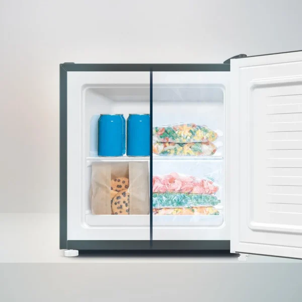 Imagen 5 Mini congelador Bolero CoolMarket TT 31 Dual Grey Glass E de 31L. Diseño en cristal gris, función dual y eficiencia clase E. Ideal para espacios reducidos.