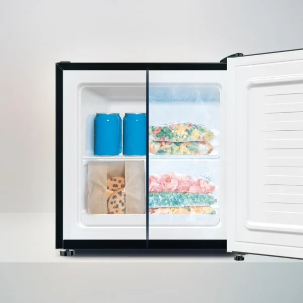 Imagen 6 Mini frigorífico de sobremesa Cecotec de 31L con función dual, diseño en cristal negro y eficiencia clase E. Ideal para espacios reducidos y uso versátil.