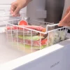 Imagen 7 Congelador horizontal de 99 litros con sistema Dual Function para uso como frigorífico o congelador, control mecánico y eficiencia energética de clase E.