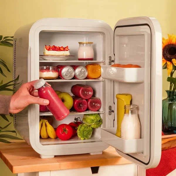 Imagen 4 Frigorífico retro Bolero MiniCooling 25L Bahamas Pat 1 de Cecotec. Capacidad de 25 litros, función frío/calor (7-65 ºC) y conexión 12V-220V para coche y hogar.