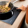 Imagen 6 Placa vitrocerámica Cecotec Bolero Squad V 2001 con 2 zonas, 3000 W de potencia, 9 niveles y control táctil. Diseño compacto y eficiente para tu cocina.