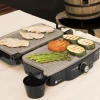 Imagen 5 Parrilla eléctrica de 1500 W con revestimiento RockStone antiadherente. Apertura de 180º, placa superior flotante y cajetín recogegrasas para cocina limpia.