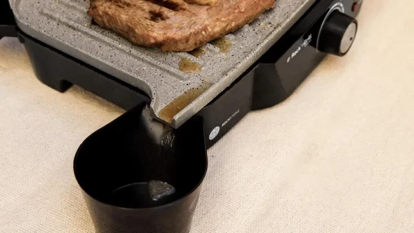 Imagen 6 Parrilla eléctrica de 1500 W con revestimiento RockStone antiadherente. Apertura de 180º, placa superior flotante y cajetín recogegrasas para cocina limpia.