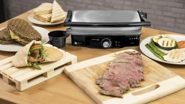 Imagen 8 Parrilla eléctrica de 1500 W con revestimiento RockStone antiadherente. Apertura de 180º, placa superior flotante y cajetín recogegrasas para cocina limpia.