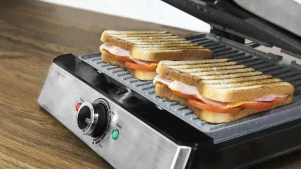 Imagen 3 Parrilla eléctrica Rock'nGrill Pro de 2000 W con revestimiento RockStone. Placas extraíbles, reversibles y apertura de 180º para un cocinado uniforme.