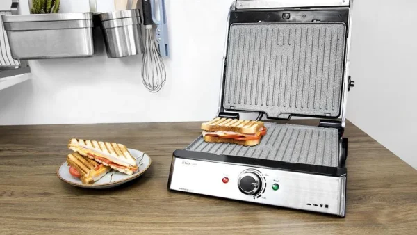 Imagen 8 Parrilla eléctrica Rock'nGrill Pro de 2000 W con revestimiento RockStone. Placas extraíbles, reversibles y apertura de 180º para un cocinado uniforme.