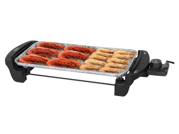 Plancha eléctrica Cecotec Rock&Water 2000 con superficie de piedra RockStone y alimentos cocinados