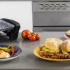 Imagen 7 Plancha eléctrica de 1800 W con revestimiento RockStone de gran dureza y antiadherencia. Incluye termostato regulable, superficie amplia y cajetín recogegrasas.