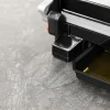 Imagen 5 Parrilla eléctrica de 2400 W con revestimiento RockStone y apertura de 180º. Calentamiento ultrarrápido, placa flotante y superficie antiadherente ecológica.