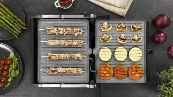 Imagen 6 Parrilla eléctrica de 2400 W con revestimiento RockStone y apertura de 180º. Calentamiento ultrarrápido, placa flotante y superficie antiadherente ecológica.