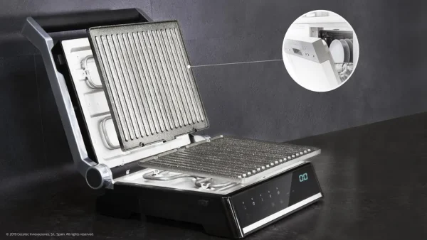 Imagen 4 Parrilla eléctrica 2000 W con sistema AutoCook, apertura 180º y placas extraíbles. Revestimiento RockStone antiadherente y control de temperatura automático.