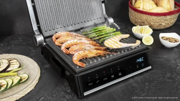 Imagen 5 Parrilla eléctrica 2000 W con sistema AutoCook, apertura 180º y placas extraíbles. Revestimiento RockStone antiadherente y control de temperatura automático.