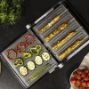 Imagen 7 Parrilla eléctrica 2000 W con sistema AutoCook, apertura 180º y placas extraíbles. Revestimiento RockStone antiadherente y control de temperatura automático.