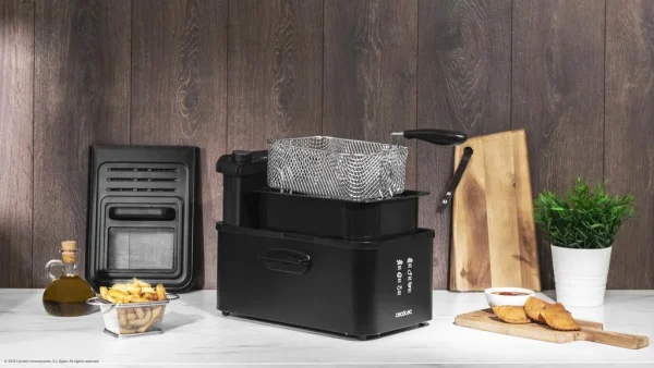 Imagen 3 Freidora eléctrica de 3 litros con filtro OilCleaner para mantener el aceite limpio. 2400 W de potencia, temporizador de 30 minutos y diseño elegante en negro.
