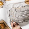 Imagen 4 Freidora eléctrica de 3 litros con filtro OilCleaner para mantener el aceite limpio. 2400 W de potencia, temporizador de 30 minutos y diseño elegante en negro.