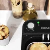 Imagen 6 Freidora eléctrica de 3 litros con filtro OilCleaner para mantener el aceite limpio. 2400 W de potencia, temporizador de 30 minutos y diseño elegante en negro.