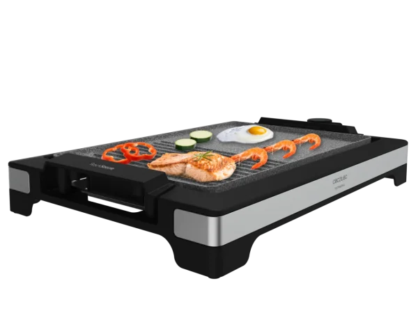 Imagen 2 Plancha eléctrica de 2000 W con acabados inox y superficie mixta. Revestimiento RockStone antiadherente y termostato regulable para una cocina precisa.