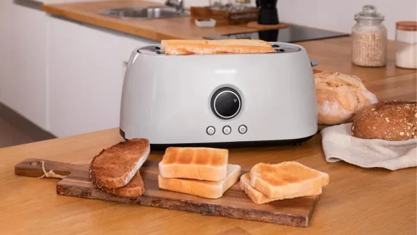Imagen 7 Tostadora digital beige de 1500 W con 2 ranuras largas extraanchas para 4 tostadas. Incluye soporte para panecillos, 3 funciones, luz LED y control de tiempo.