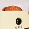 Imagen 5 Tostadora digital amarilla de 1500 W con 2 ranuras largas para 4 tostadas. Diseño retro, pantalla con cuenta atrás y varillas calientabollos. 3 funciones.