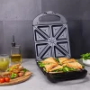 Imagen 3 Sandwichera Rock'nToast Family de 1500 W con capacidad para 4 sándwiches. Acabados en acero inoxidable y revestimiento antiadherente para un tostado perfecto.