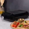 Imagen 8 Sandwichera Rock'nToast Family de 1500 W con capacidad para 4 sándwiches. Acabados en acero inoxidable y revestimiento antiadherente para un tostado perfecto.