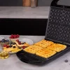 Imagen 6 Sandwichera 3 en 1 de 1500 W con capacidad para 4 sándwiches. Placas intercambiables RockStone para gofres y grill. Cocinado uniforme y limpieza sencilla.