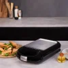 Imagen 7 Sandwichera 3 en 1 de 1500 W con capacidad para 4 sándwiches. Placas intercambiables RockStone para gofres y grill. Cocinado uniforme y limpieza sencilla.