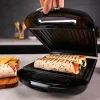 Imagen 8 Sandwichera 3 en 1 de 1500 W con capacidad para 4 sándwiches. Placas intercambiables RockStone para gofres y grill. Cocinado uniforme y limpieza sencilla.
