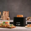 Imagen 4 Tostadora de 980 W con 2 ranuras cortas extraanchas y acabados en acero inoxidable. Incluye soporte para bollería, 3 funciones y 6 niveles de potencia.