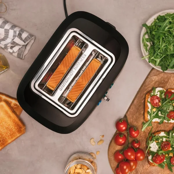 Imagen 6 Tostadora de 980 W con 2 ranuras cortas extraanchas y acabados en acero inoxidable. Incluye soporte para bollería, 3 funciones y 6 niveles de potencia.