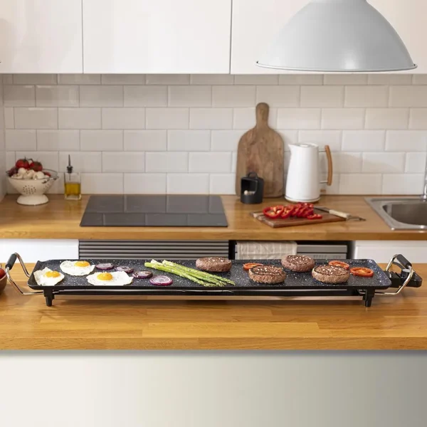 Imagen 2 Plancha de asar eléctrica de 2400 W con superficie XXL de 90x22 cm. Revestimiento RockStone antiadherente, termostato regulable y apta para lavavajillas.