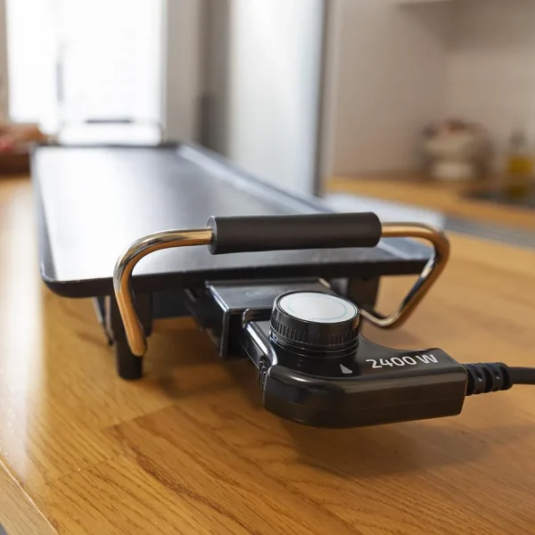 Imagen 5 Plancha de asar eléctrica de 2400 W con superficie XXL de 90x22 cm. Revestimiento RockStone antiadherente, termostato regulable y apta para lavavajillas.