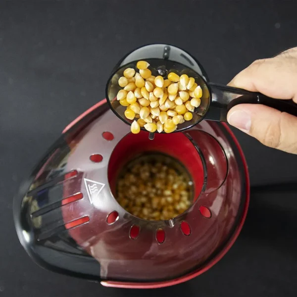 Imagen 8 Palomitero eléctrico de 1200 W con sistema de convección. Elabora palomitas saludables sin aceite en 2 minutos. Incluye cuchara dosificadora y fácil limpieza.