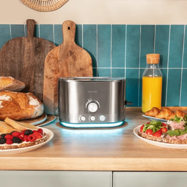 Imagen 4 Tostadora de doble ranura con 850 W y acabado en acero inoxidable. Cuenta con ranuras extraanchas de 3,8 cm, varillas superiores y sistema de autocentrado.