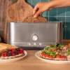 Imagen 5 Tostadora de acero inoxidable de 1050 W con 2 ranuras anchas de 3,8 cm. Incluye soporte para panecillos, anillo luminoso y sistema de autocentrado.