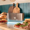 Imagen 8 Tostadora de acero inoxidable de 1050 W con 2 ranuras anchas de 3,8 cm. Incluye soporte para panecillos, anillo luminoso y sistema de autocentrado.