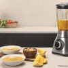 Imagen 4 Batidora de vaso de 1300 W con cuchilla de 6 hojas de titanio negro y 1,8 L de capacidad. Incluye filtro para licuados y jarra de cristal termorresistente.