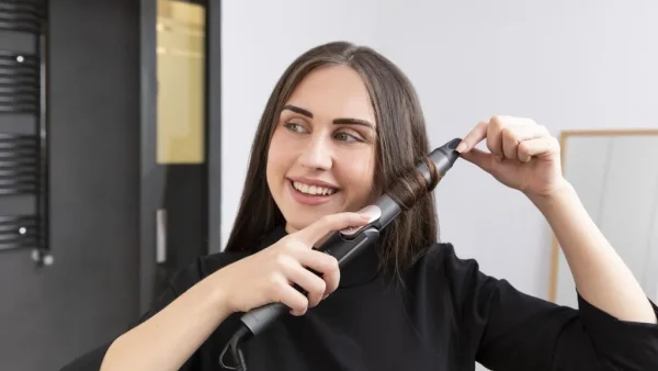 Imagen 5 Plancha de pelo Bamba RitualCare 1000 Titanium 2in1 de Cecotec con placas de titanio, selector táctil y temperatura ajustable de 140 ºC a 220 ºC.