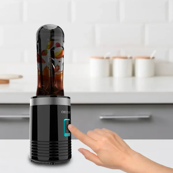 Imagen 8 Batidora de smoothies compacta con 300 W, cuchillas de titanio negro y vaso portátil de 570 ml. Ideal para batidos saludables y fáciles de transportar a diario.
