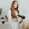 Imagen 7 Secador de pelo iónico de 2400W con motor AC profesional, gran caudal de aire y tecnología Real Ion para un cabello brillante, suave y sin encrespamiento.