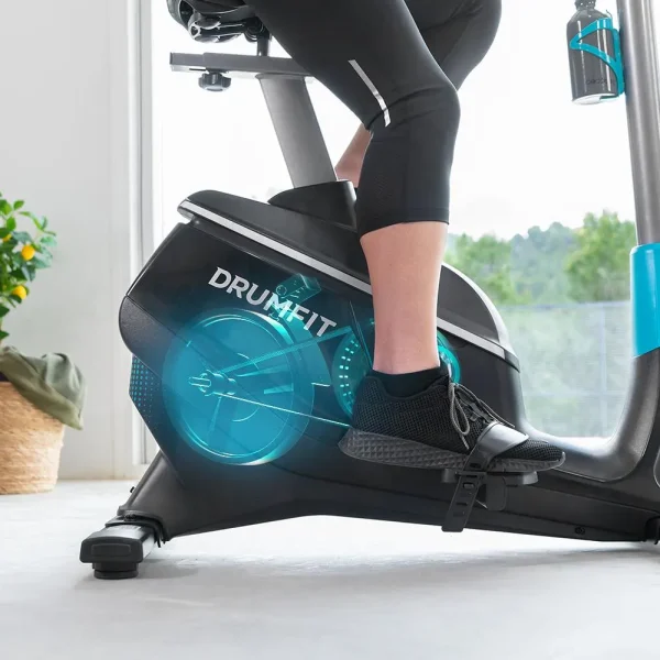 Imagen 3 Bicicleta estática DrumFit Cycle 9000 Talos Pro con resistencia magnética motorizada, pulsómetro, sillín regulable y soporte. Ideal para entrenar en casa.